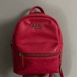 Carry your essentials with this cute mini guess backpack🫶🏻